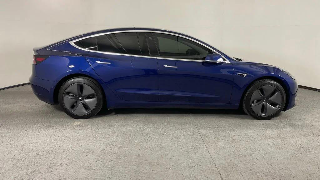 tesla model 3 2018 5YJ3E1EA0JF045030 image tesla model 3 2018 5YJ3E1EA0JF045030 image